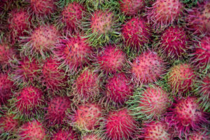 Rambutan auf einem Markt in Chiang Mai, Thailand